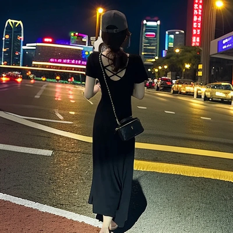 法式黑色夏季短袖连衣裙新款镂空后背气质收腰显瘦中长款a字裙