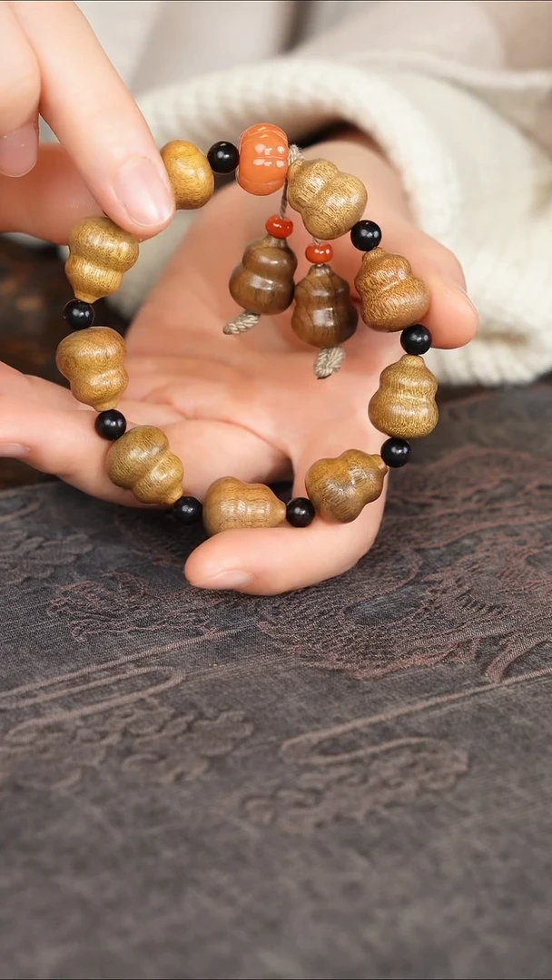 乌木类家具金丝楠阴沉木 奶瓶葫芦手串