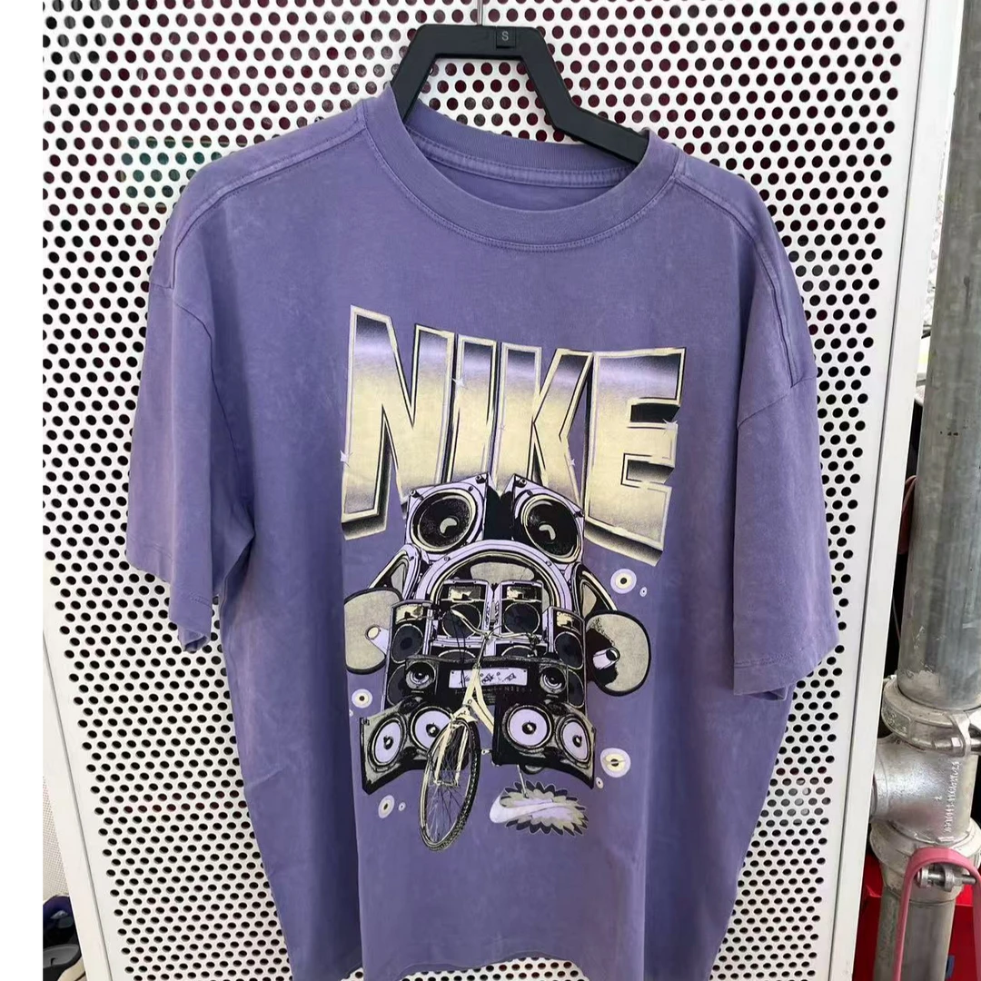 NIKE耐克女子时尚印花图案宽松圆领运动短袖T恤HF9692-527