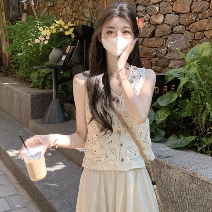 波西米亚度假风杏色无袖上衣女夏季小众外穿宽松显瘦镂空吊带背心