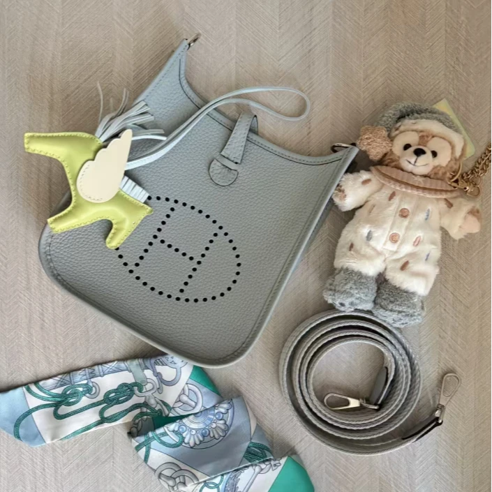 99新 Hermes/爱马仕 小花6枫Evelyne Mini 冰川蓝 TC皮 K刻金扣包