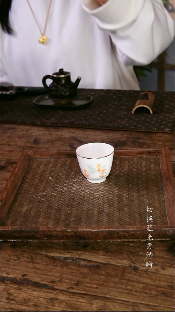 .包铜小鱼杯....