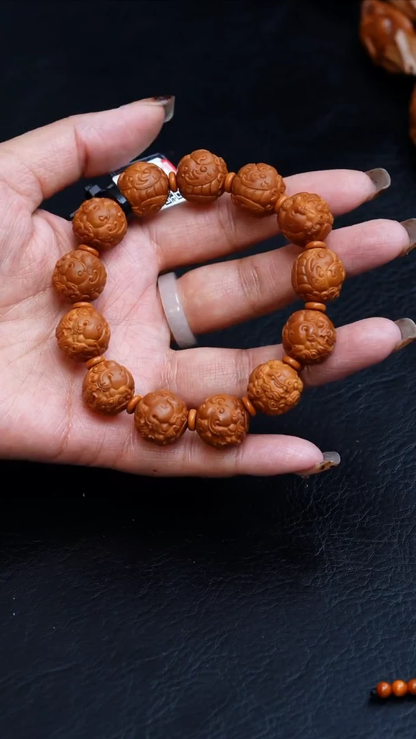 橄榄核吊坠16正圆唐狮手串