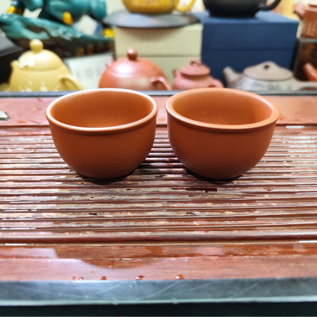 紫砂朱泥大红包橘皮茶杯一对