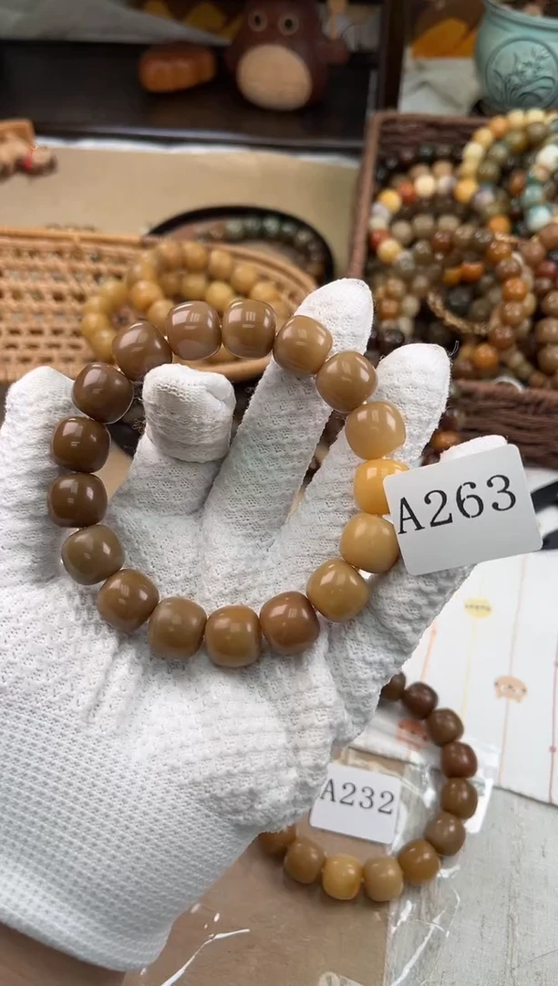 手串菩提根/象牙果猫***歌a263 卡14.5 干磨奶咖老料
