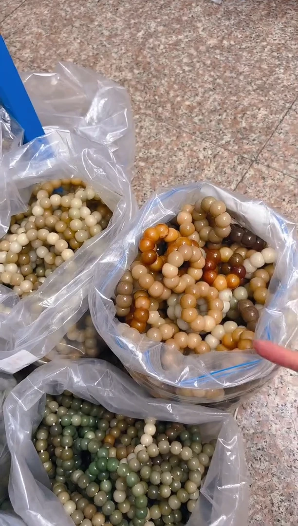 吊坠菩提根/象牙果混色手捻  颜色随机一条