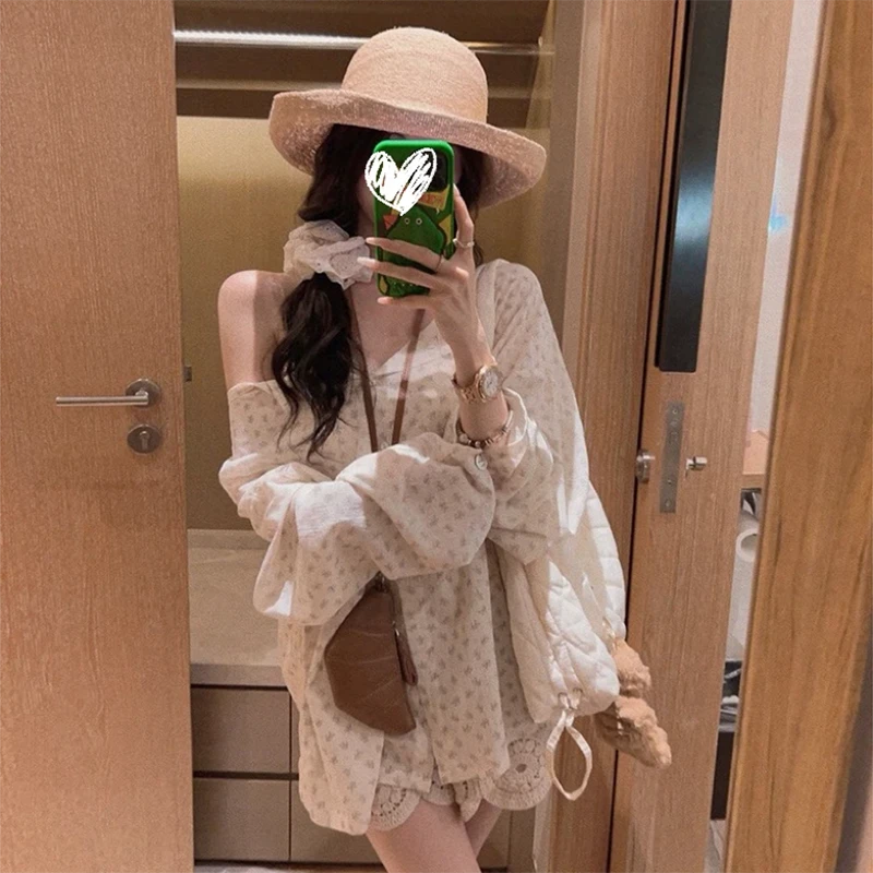 米色慵懒风薄款微透碎花防晒衬衫女夏季韩系宽松长袖时尚上衣女