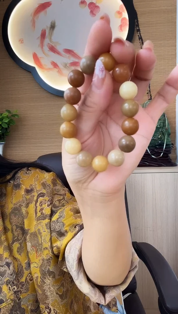 手串菩提根/象牙果@****》菩提根圆珠手串黄色