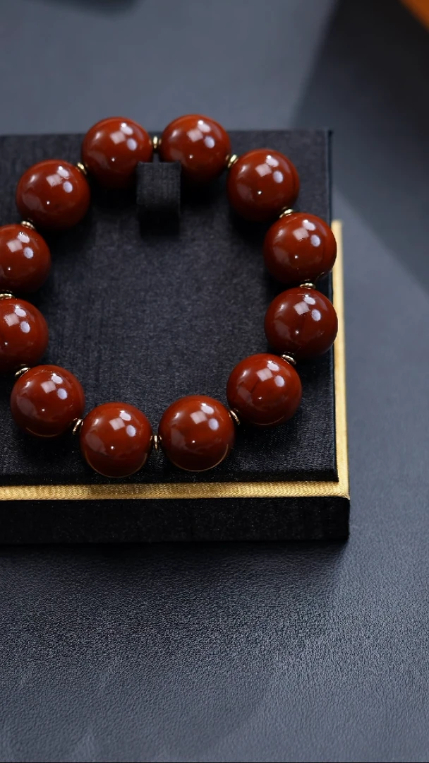 手串橄榄核我****?正圆光珠20
