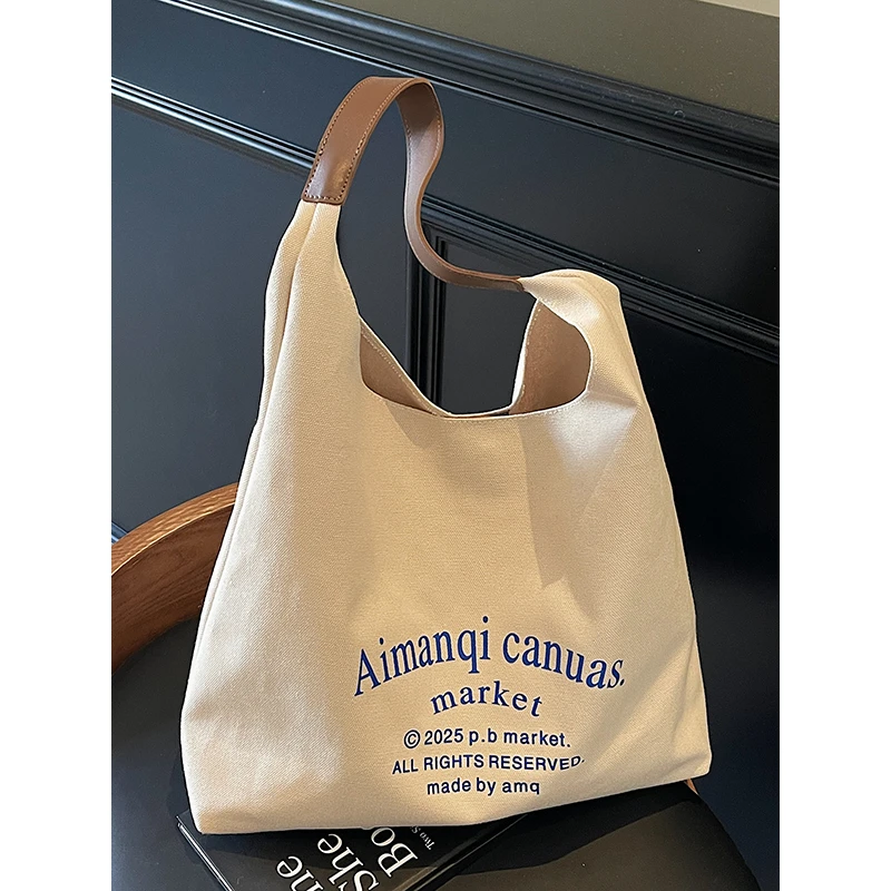 网红包包女2025新款潮春夏时尚单肩女包大容量帆布休闲百搭托特包