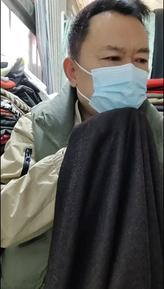 深紫咖雪花针织布料