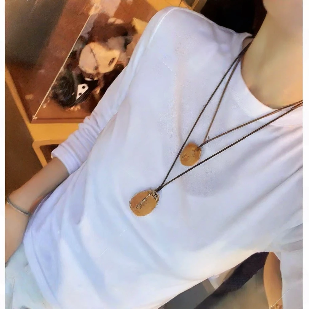 时尚纯色万能百搭长袖T恤女2025秋季新款圆领套头白色修身上衣