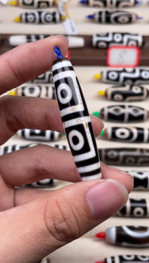 玛瑙/玉髓裸珠56.8*12.5 行运地门四眼图腾