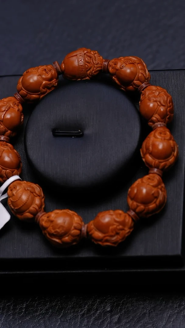 橄榄核吊坠陈***少橄榄核