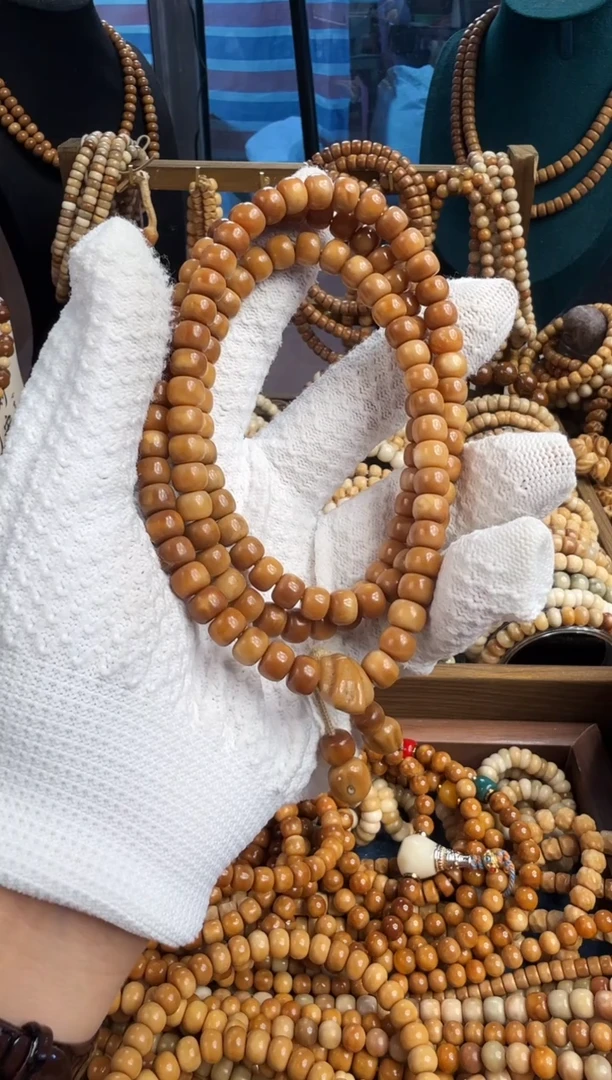 菩提根/象牙果吊坠排***角龙脊脖挂短轴老型8*6玉化料