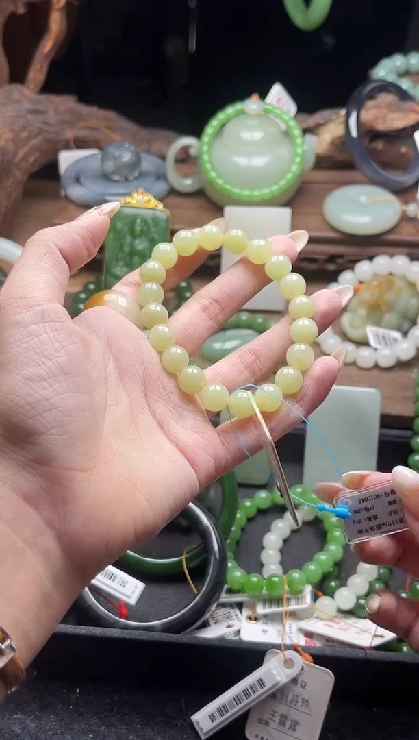 未镶嵌手串和田玉卡10若羌黄口料 圆珠 有瑕疵9015044