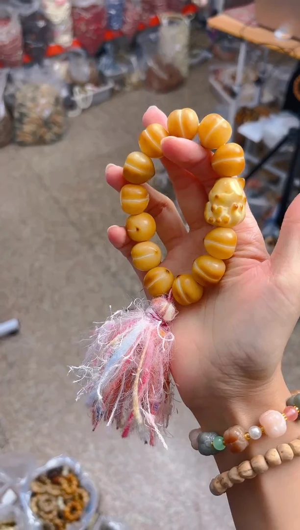 吊坠菩提根/象牙果小卡黄色屁桃手持 凤九