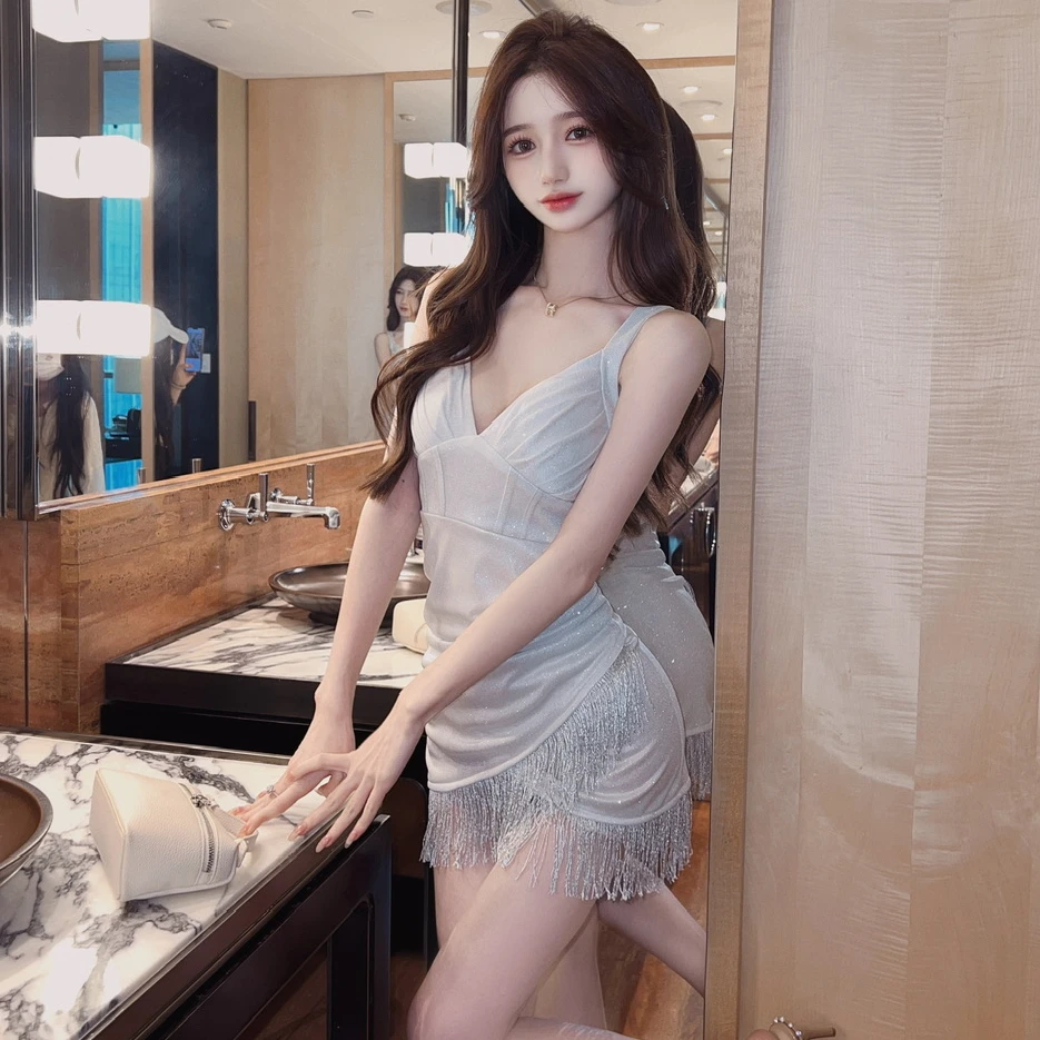 性感辣妹流苏拼接亮片低胸吊带连衣裙紧身不规则包臀短裙夜场衣服