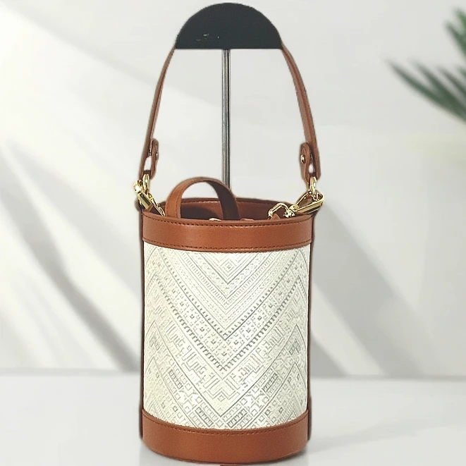 壮锦包包广西非遗轻奢时尚百搭女士休闲经典肩包紫色小水桶编织