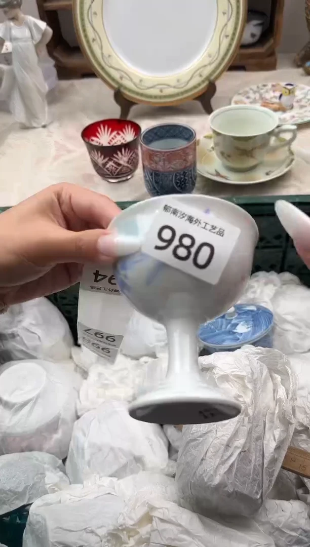 q****uK          980