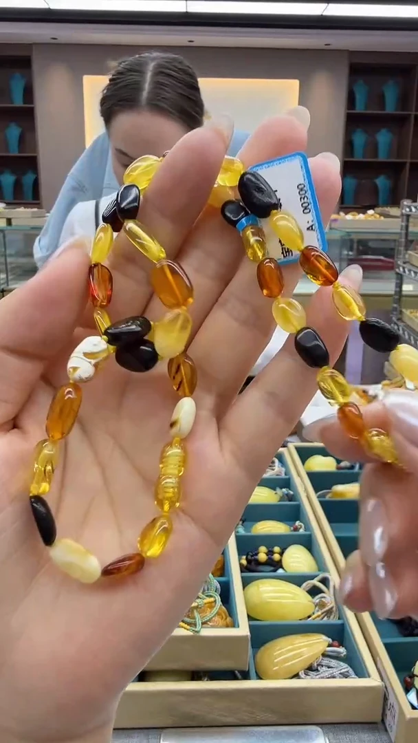 琥珀颈饰未镶嵌16秒拍号 假一罚三