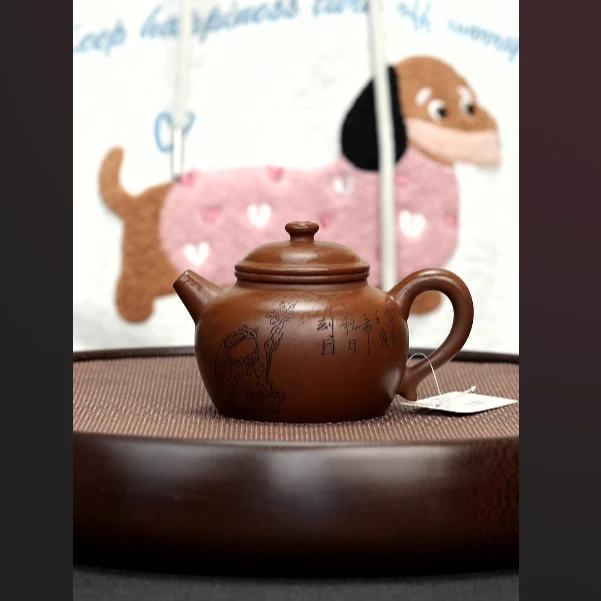 1065 原矿紫泥刻绘巨轮珠壶