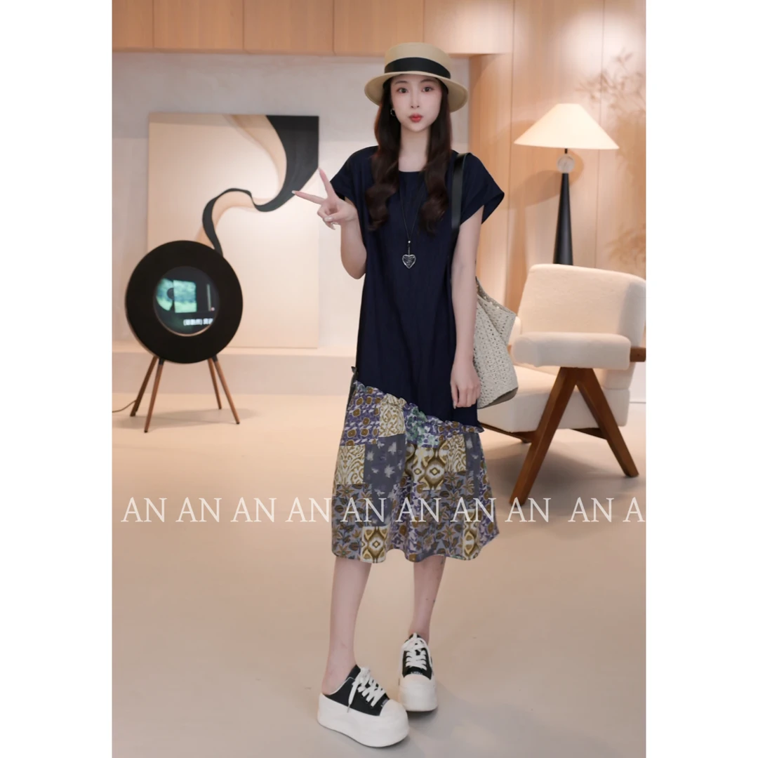 C05102夏季出游度假风设计感飞飞袖下摆拼接花朵连衣裙