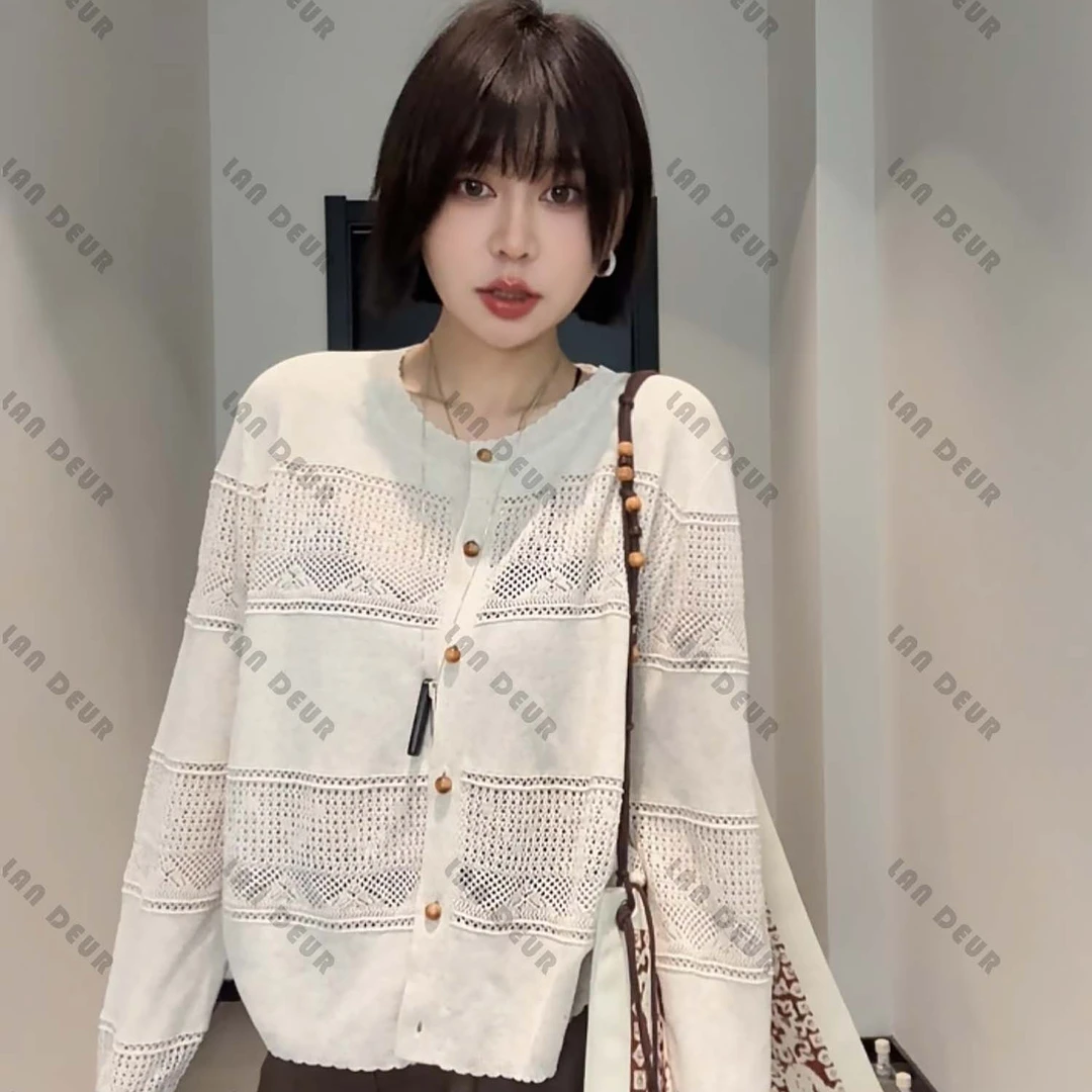 JIUJIU【织梦坊】开衫长袖网红轻奢时尚百搭镂空设计师防晒