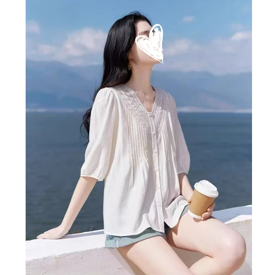 2025夏新款大码白色v领衬衫女宽松度假民族风娃娃衫小上衣8255