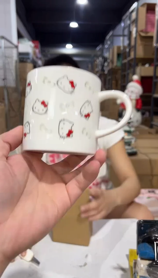 瓷片白色kt猫缕空满印水杯