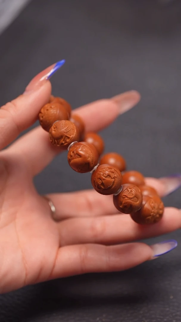 手串橄榄核1.5正圆兽面四象