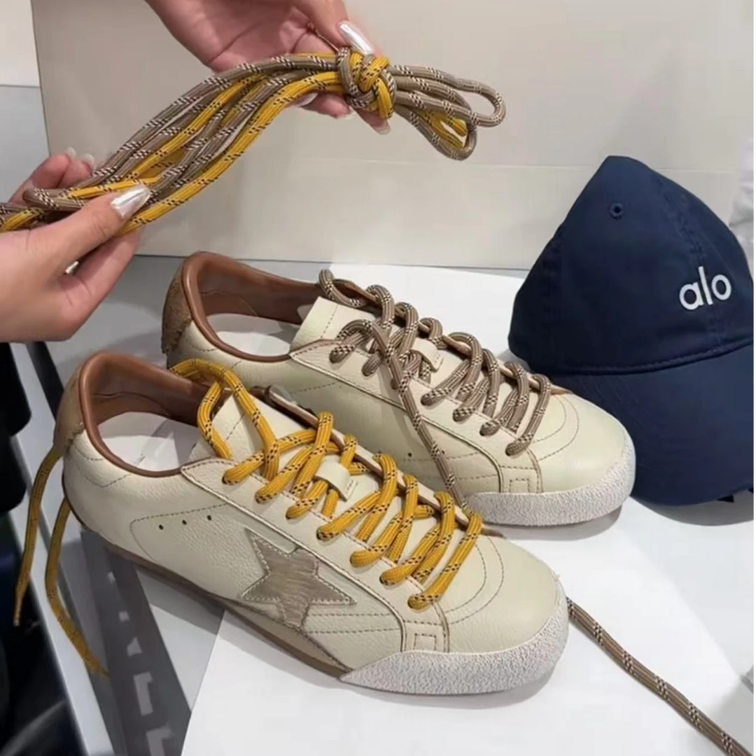 诗歌兰2025新款休闲五角星平底德训鞋女