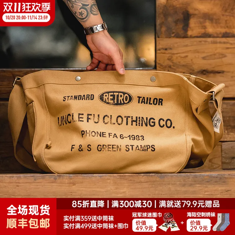 马登工装美式复古大容量斜挎报童包休闲单肩字母帆布托特邮差包男