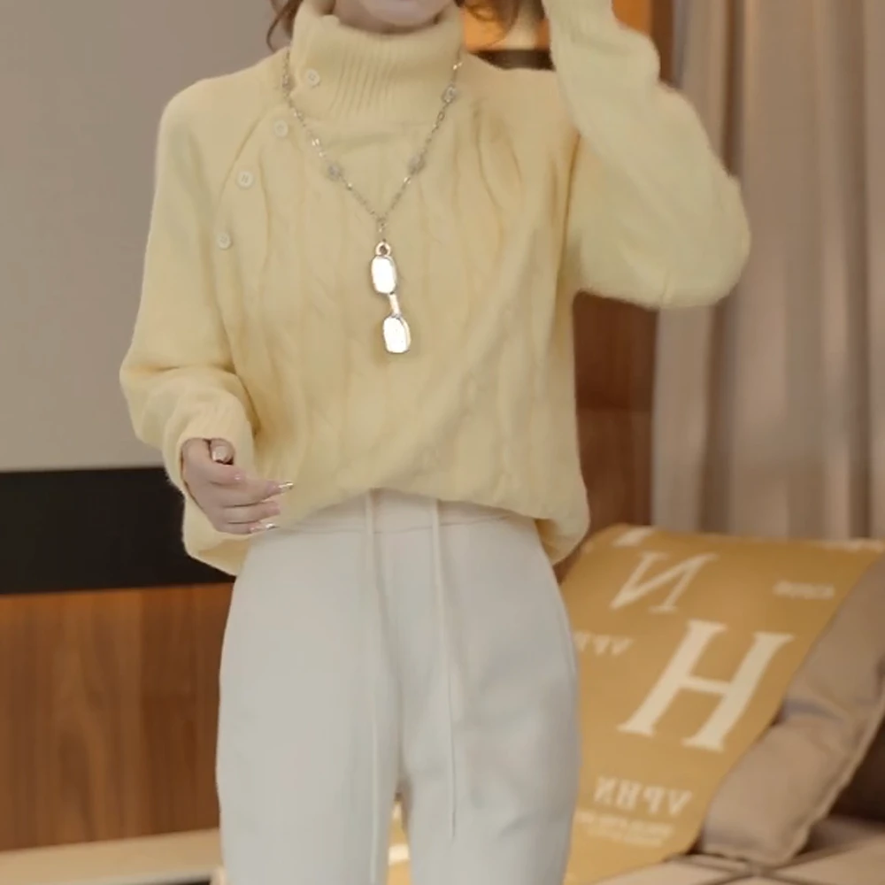 轻奢时尚秋冬新款气质洋气显瘦宽松不规则斜扣高领糖果色毛衣女