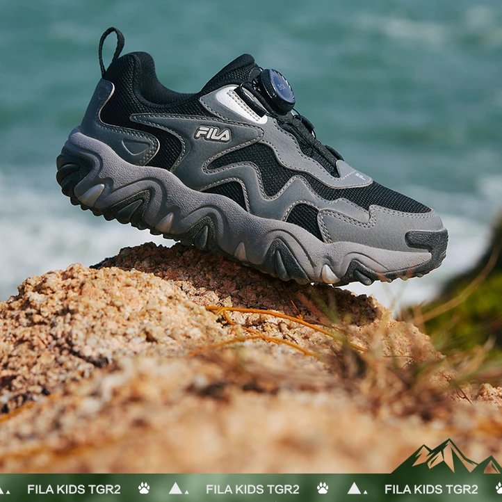 FILA/斐乐童鞋25春新款男女中大童防滑户外综训虎爪鞋K15B512504F