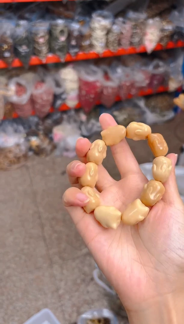 吊坠菩提根/象牙果风化趴趴兔单圈手串