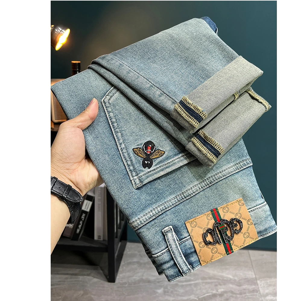 曼库帕娅高端牛仔裤男修身小脚刺绣痞帅炸街潮牌浅色男生裤子