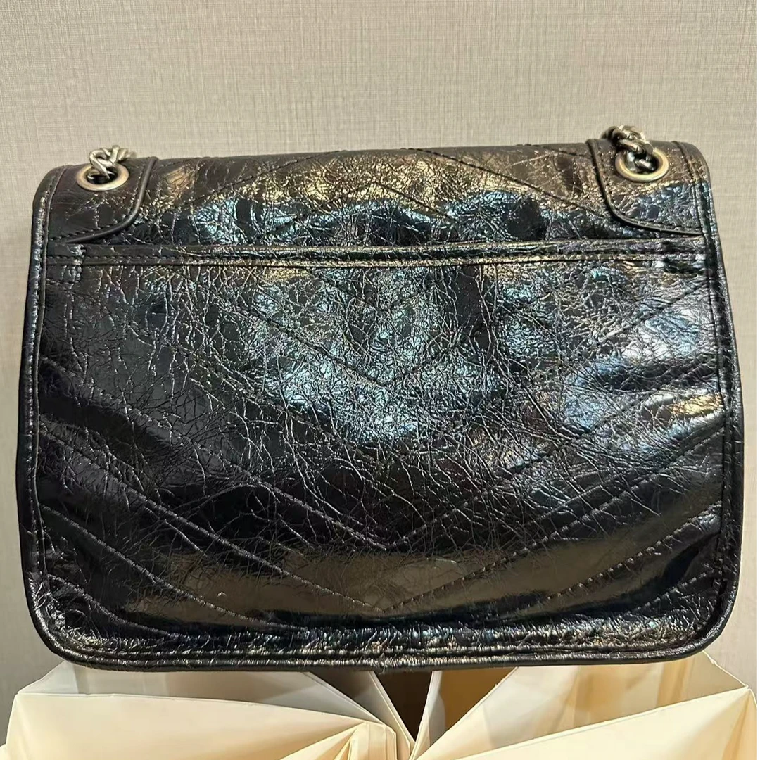 TOLEX2025新款百搭时尚女包邮差中黑色