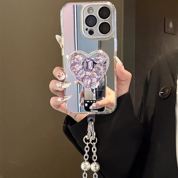 徐艺洋同款紫色闪钻爱心镜面适用苹果16promax手机壳15/14/13支架