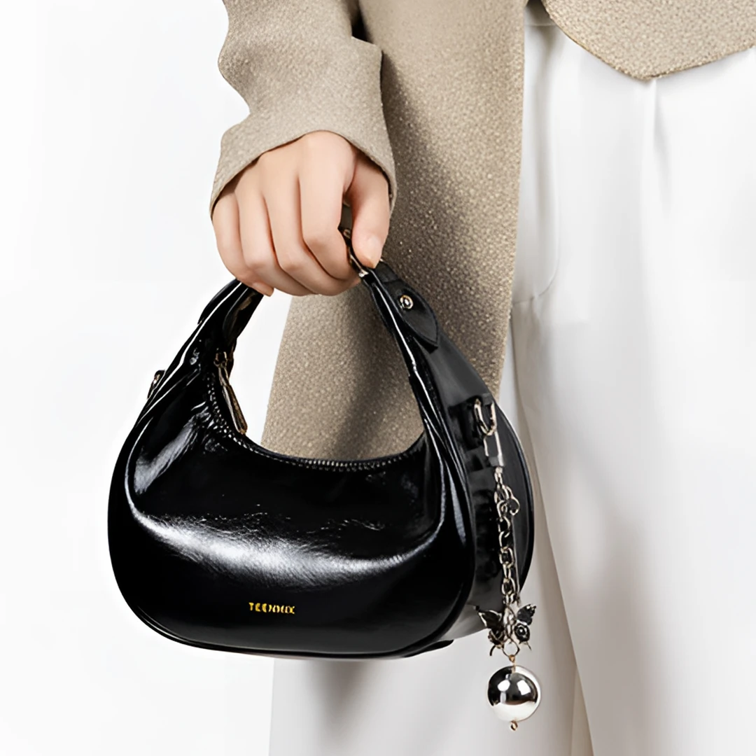 天美意女包2025新款牛皮月牙包HOBO包斜挎单肩包手提包饭盒包