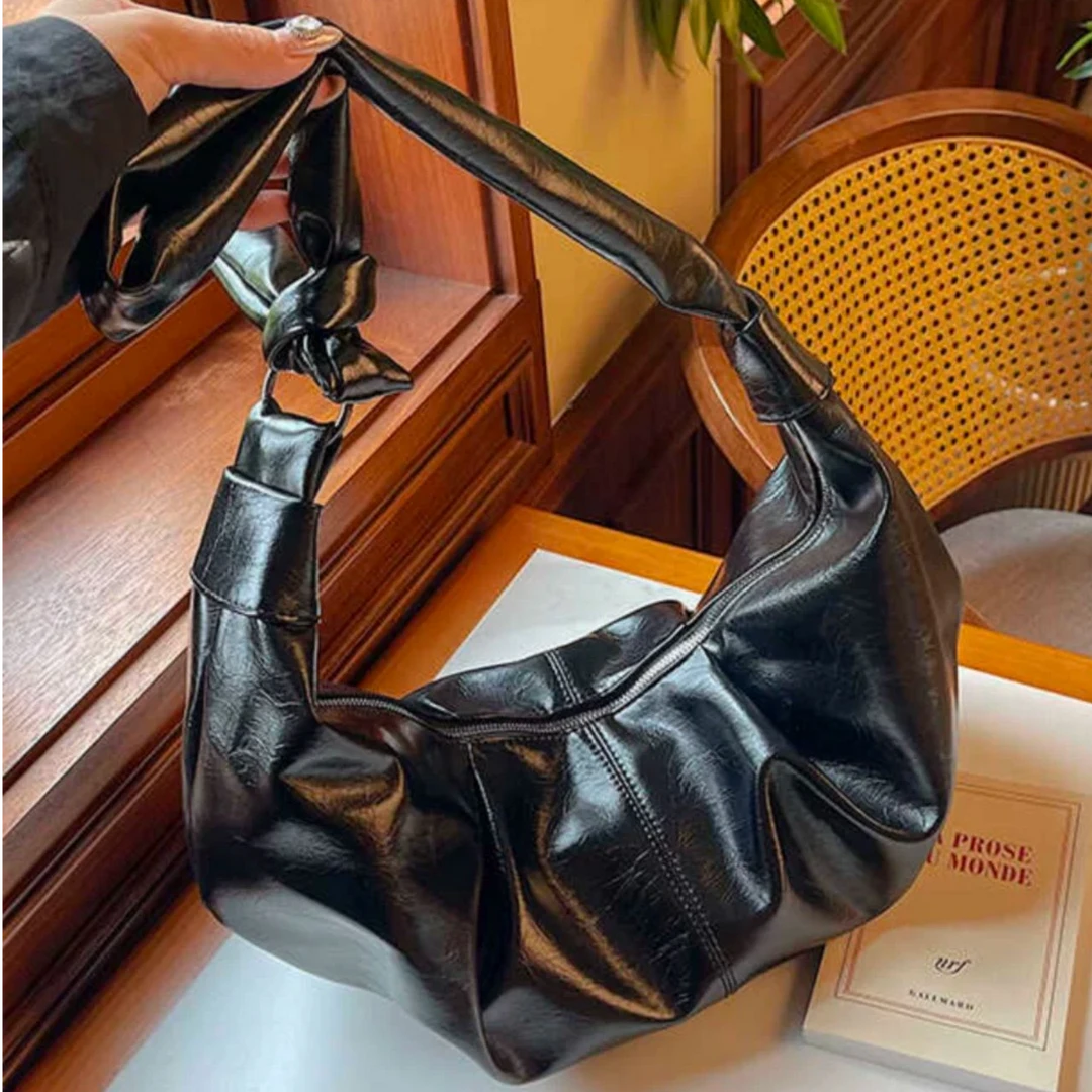 高级感小众包包女2025新款韩国时尚大容量牛角包百搭休闲斜挎包