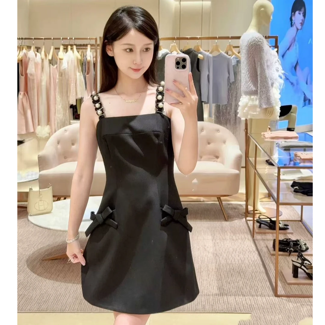 黑色吊带连衣裙2025秋季新款千金风减龄无袖短裙蝴蝶结收腰背心裙