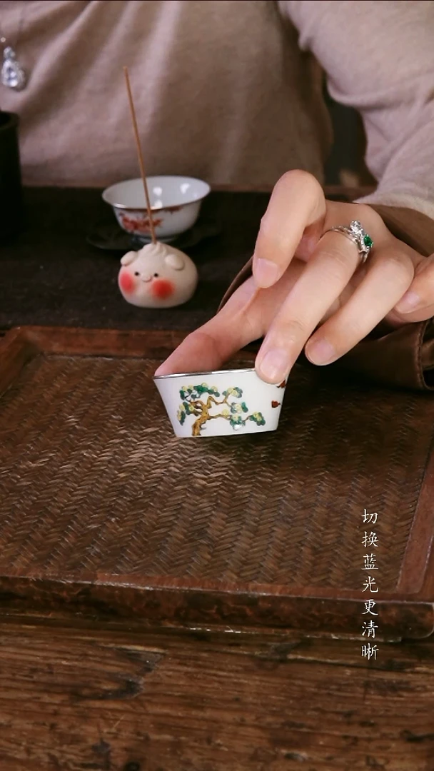 .包银摇钱树直筒杯