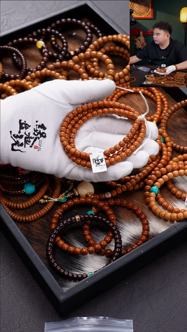 手串橄榄核o***王正三花核尖7.1红料