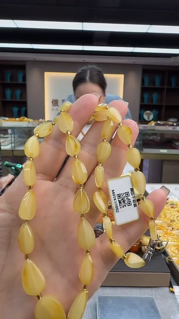 琥珀颈饰未镶嵌28秒拍号 假一罚三