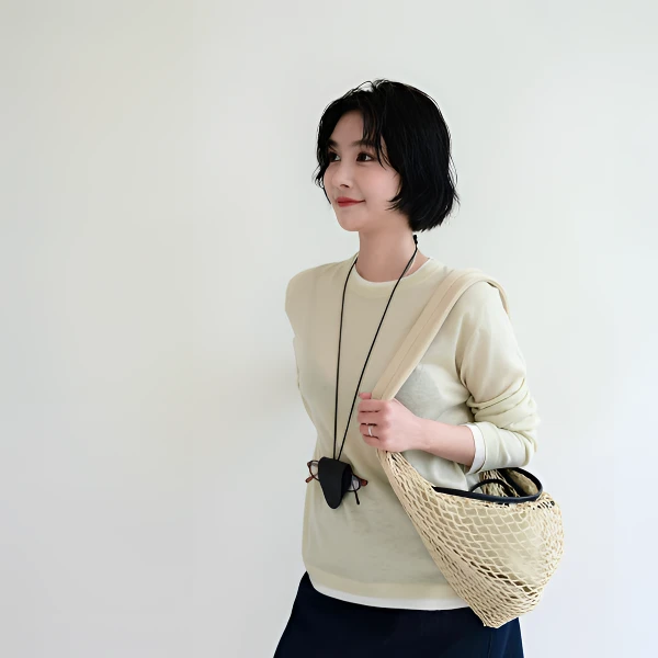 USHARK新款秀场斜跨编织包小众时尚百搭撞色镂空渔网牛角网兜包