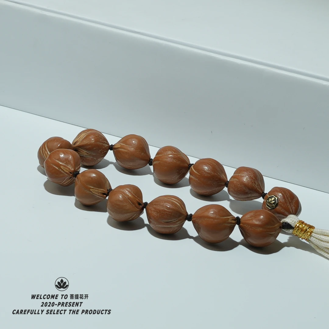 橄榄核（鹰嘴三花铁核）短圆款手持时尚文玩好物