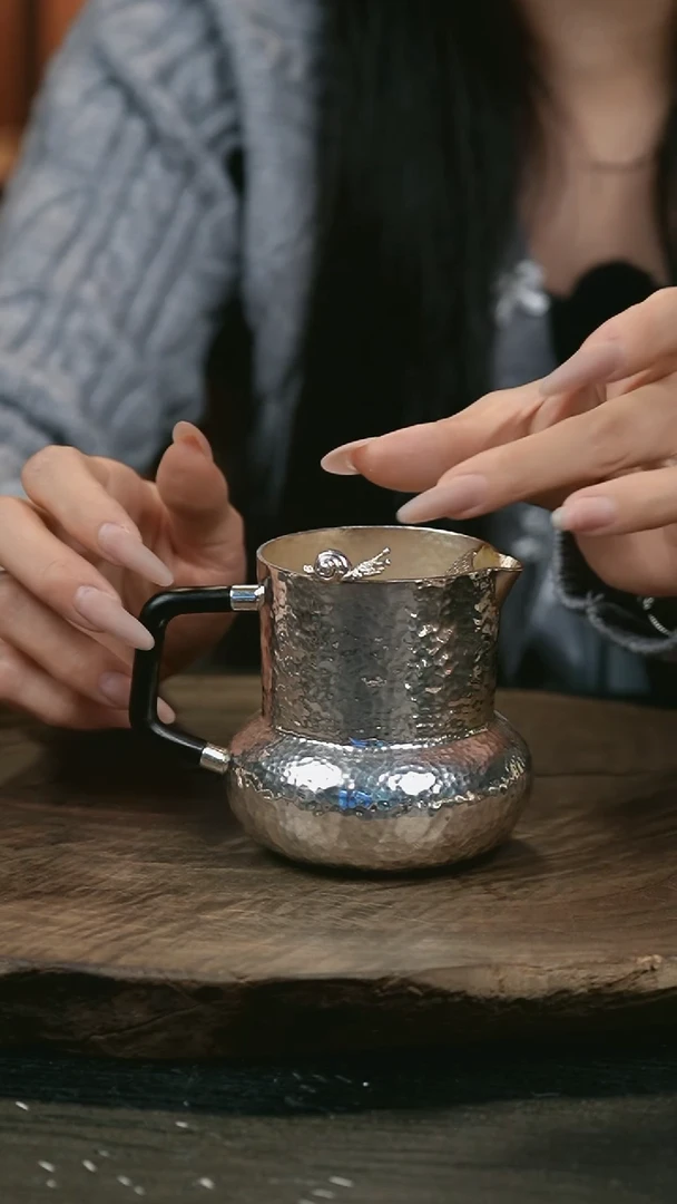 手工蜗牛公道银杯999