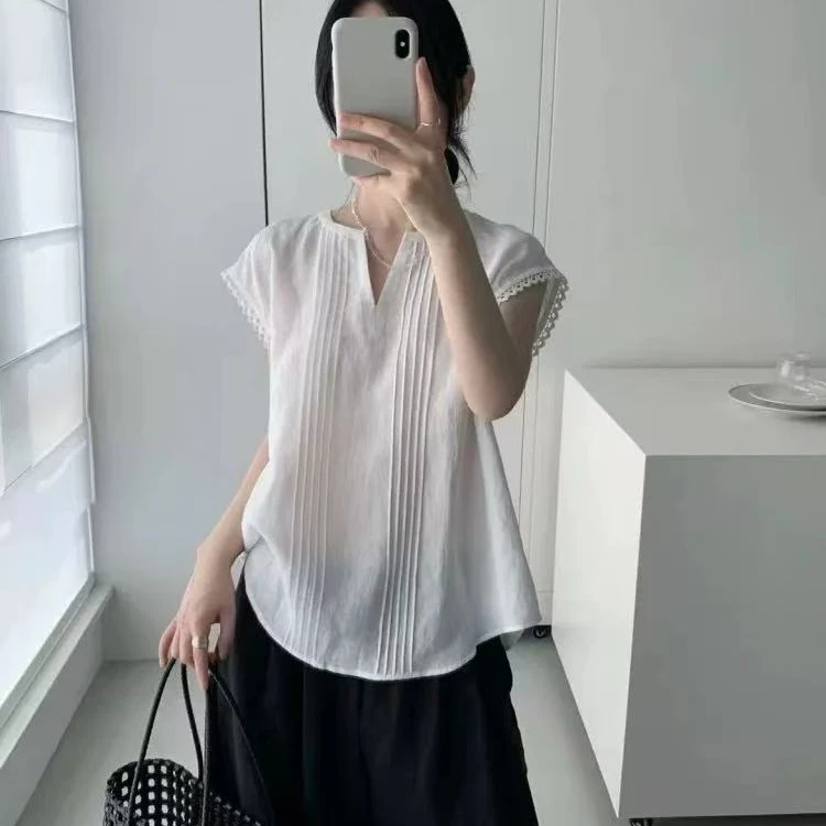 925230简单既高级 袖子镂空设计慵懒上衣