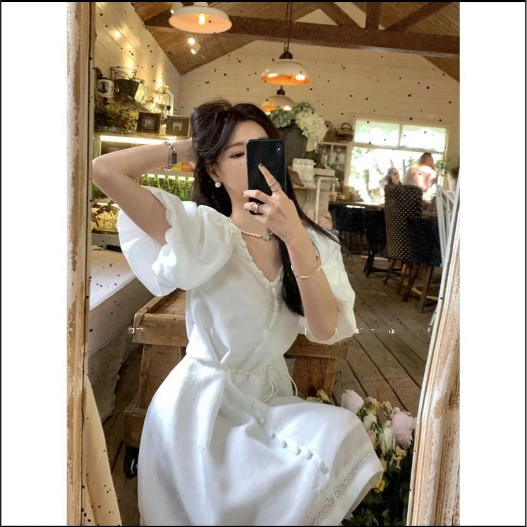 白色法式复古v领灯笼袖连衣裙女夏短袖温柔度假风短裙A8-17